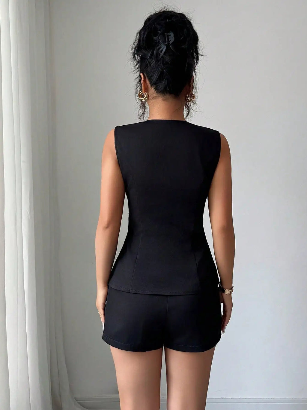 Women's Sleeveless Two-Piece Set with Gold Buttons & Peplum Waist