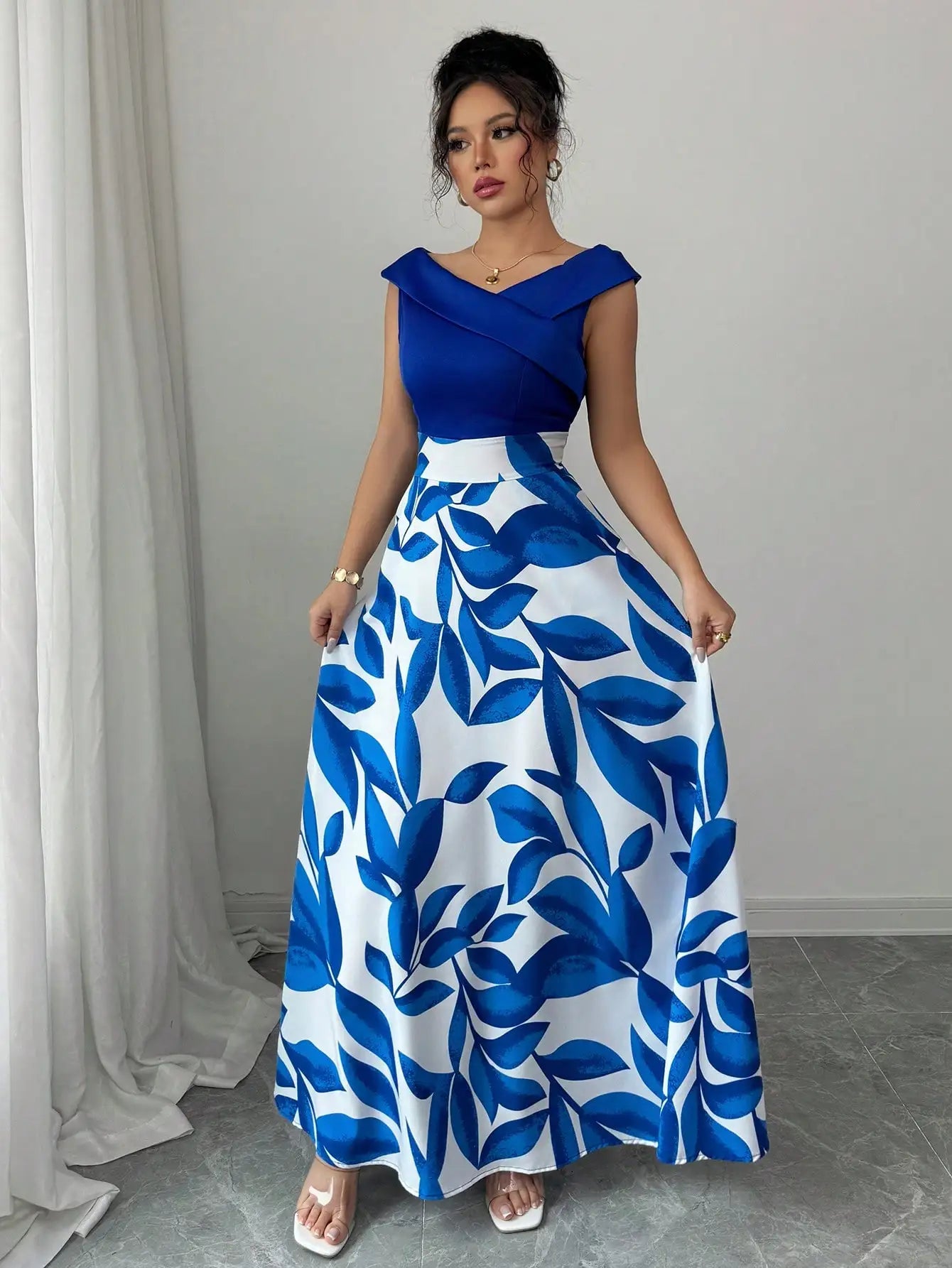 Women's Blue White Floral Maxi Dress Asymmetric Neckline Color Block Design Ideal for Evening Events Garden Parties Elegant Styl